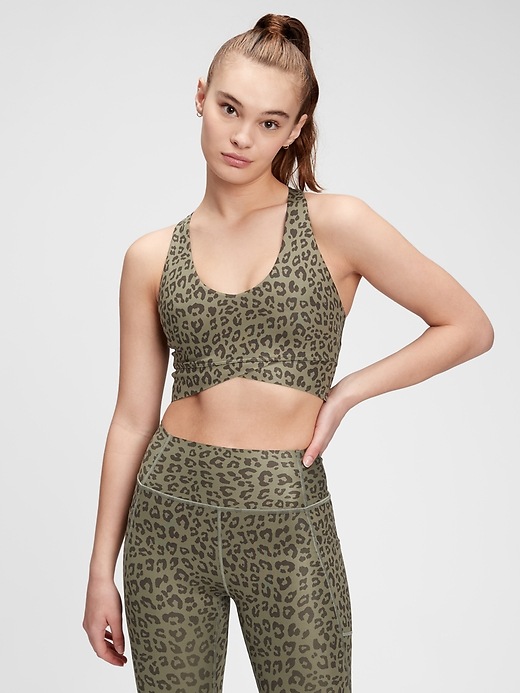 1 of 8 showing, with the color olive green leopard of product GapFit Sculpt Medium Impact Wrap Front Sports Bra