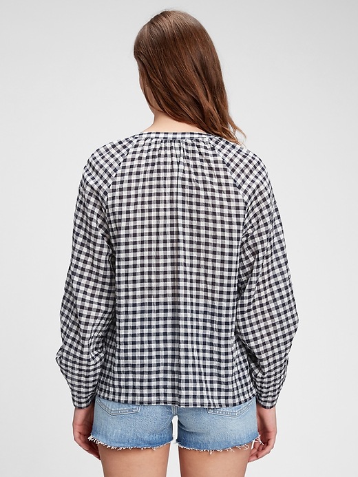 2 of 8 showing, with the color navy blue gingham of product Ruched Sleeve Top