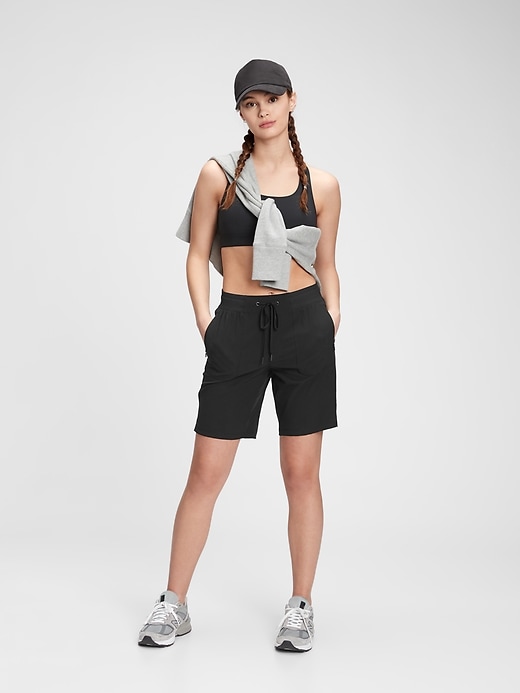 1 of 8 showing, with the color true black of product GapFit Bermuda Hike Shorts