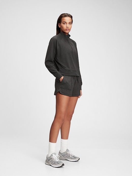 1 of 8 showing, with the color true black of product GapFit Brushed Tech Jersey Half-Zip Sweatshirt