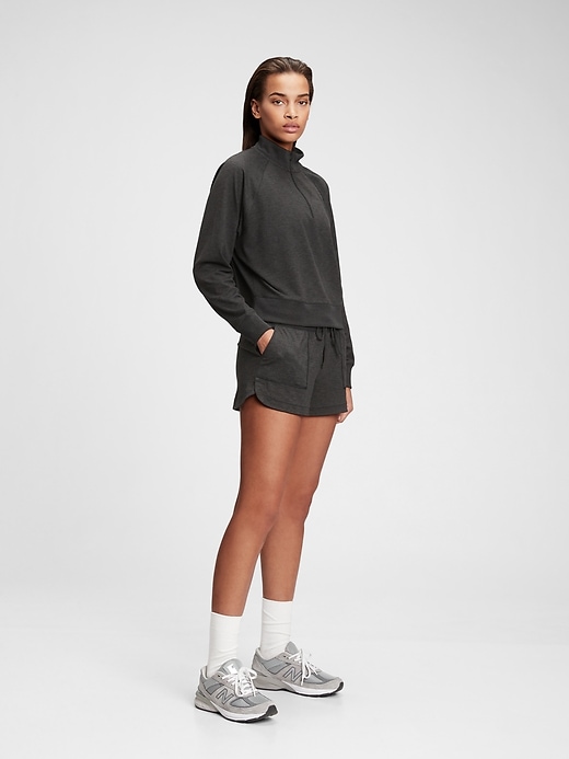 View large product image 1 of 8. GapFit Brushed Tech Jersey Half-Zip Sweatshirt