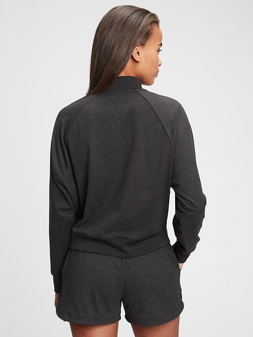 2 of 8 showing, with the color true black of product GapFit Brushed Tech Jersey Half-Zip Sweatshirt