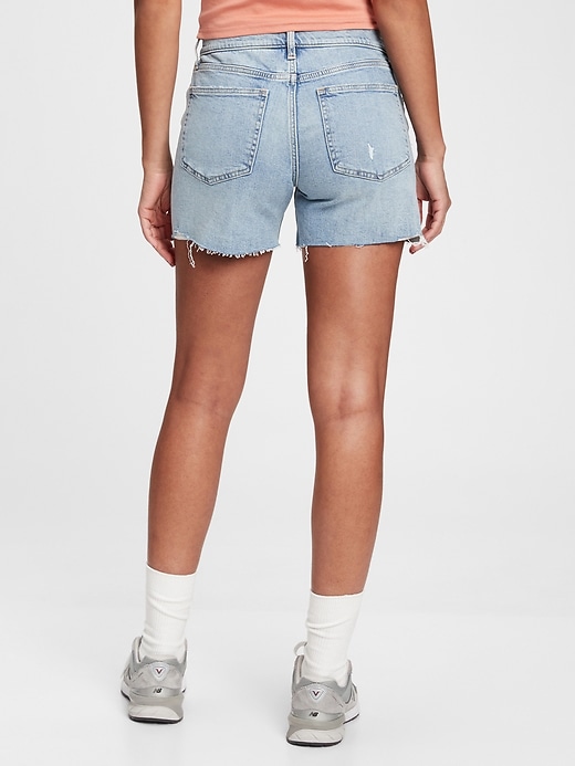 2 of 8 showing, with the color light indigo of product 5'' Mid Rise Destructed Denim Shorts With Washwell