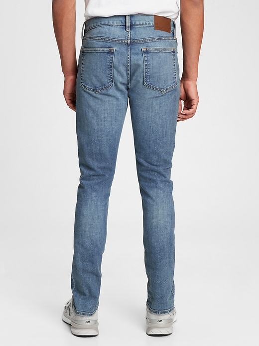 2 of 8 showing, with the color light denim of product GapFlex Slim Jeans With Washwell™