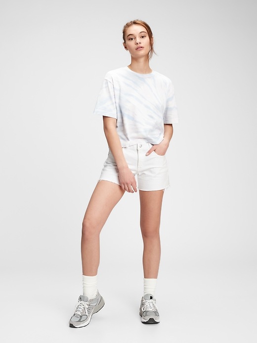 1 of 8 showing, with the color optic white of product 5" Mid Rise Denim Shorts