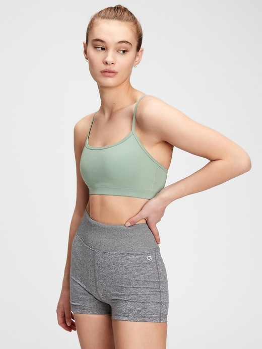 1 of 8 showing, with the color sage green of product GapFit Sculpt Low Support Racerback Sports Bra