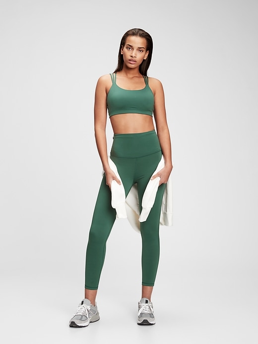 1 of 8 showing, with the color teal green of product GapFit Sky High Rise 7/8 Leggings in Eclipse