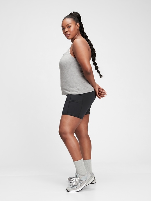 2 of 8 showing, with the color pilot grey of product GapFit Brushed Tech Jersey Strappy Back Tank Top