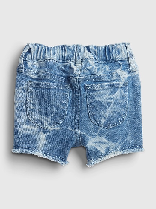 2 of 8 showing, with the color blue tie dye of product Toddler Elasticized Pull-On Tie-Dye Denim Shortie Shorts with Stretch