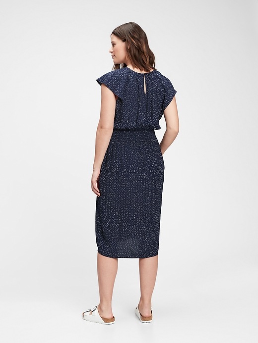 2 of 8 showing, with the color indigo blue dot of product Maternity Smocked Flutter Sleeve Dress
