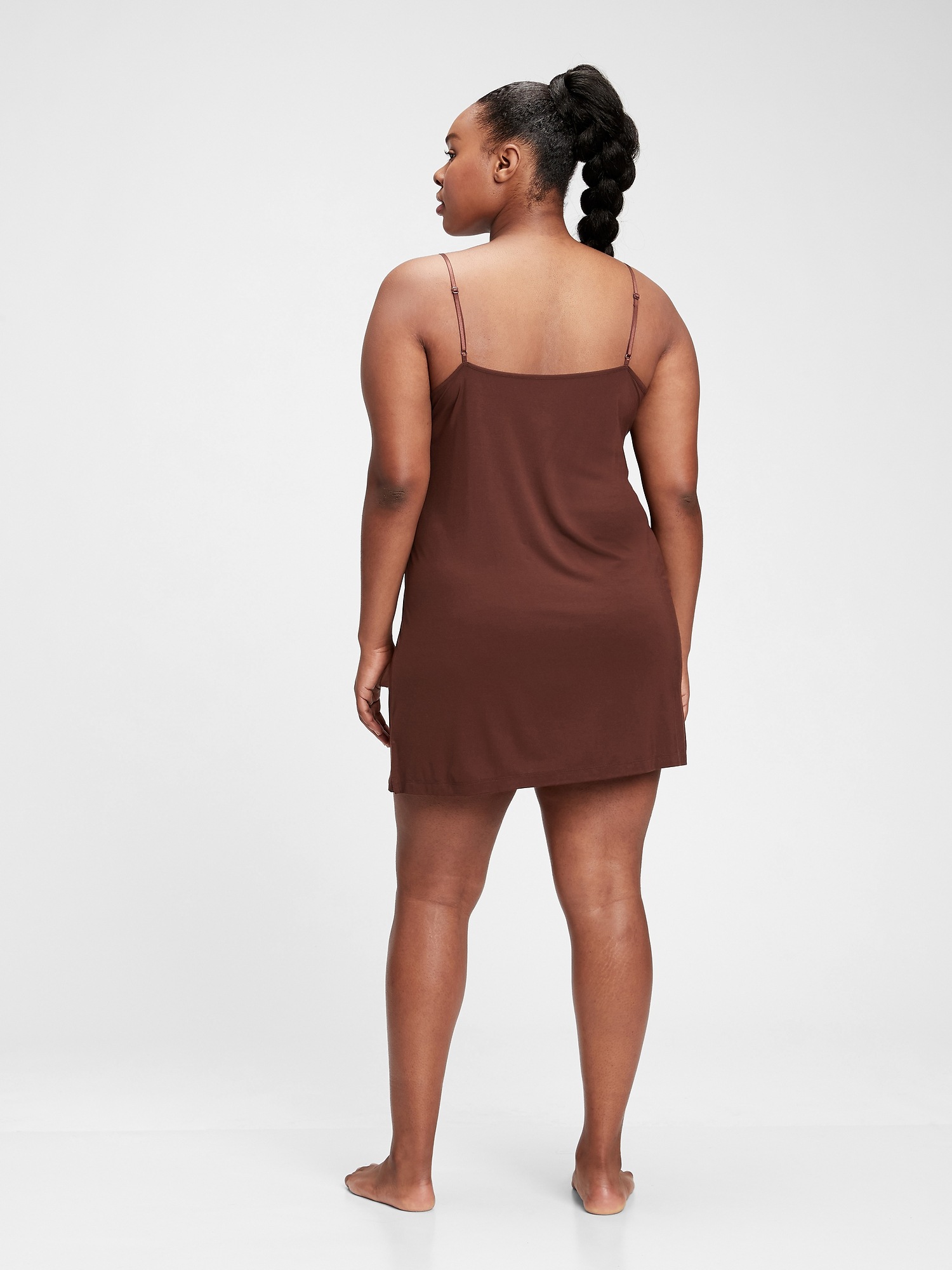 slip dress with long sleeve shirt underneath