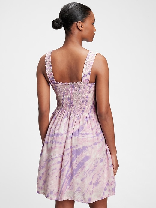 2 of 8 showing, with the color purple lilac tie dye of product Smocked Mini Dress