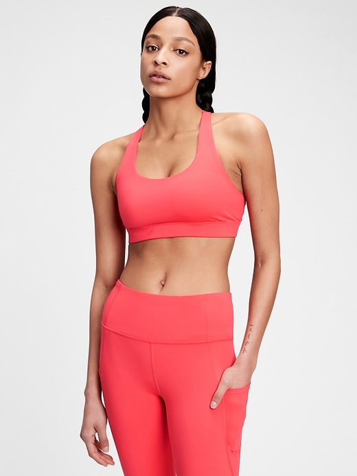 1 of 8 showing, with the color rose bush pink of product GapFit Blackout Medium Impact Crossback Sports Bra