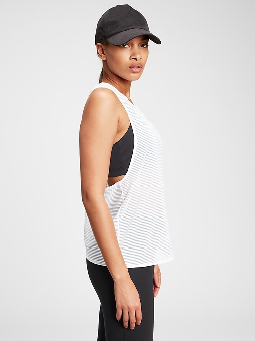1 of 8 showing, with the color white of product GapFit Shadow Stripe Crossback Tank Top