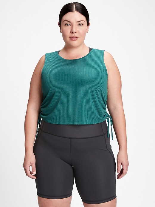 2 of 8 showing, with the color peacock green of product GapFit Breathe Pointelle Ruched Side Tank Top