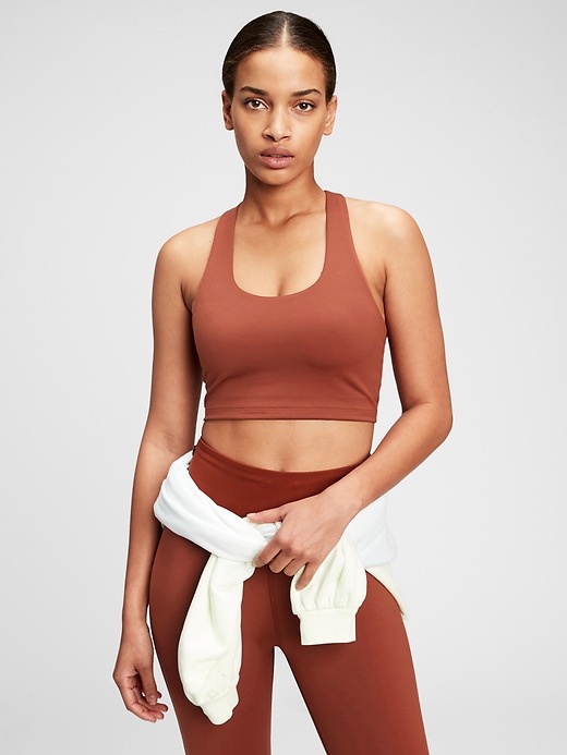 1 of 8 showing, with the color burnt russet red of product GapFit Eclipse Racerback Longline Sports Bra