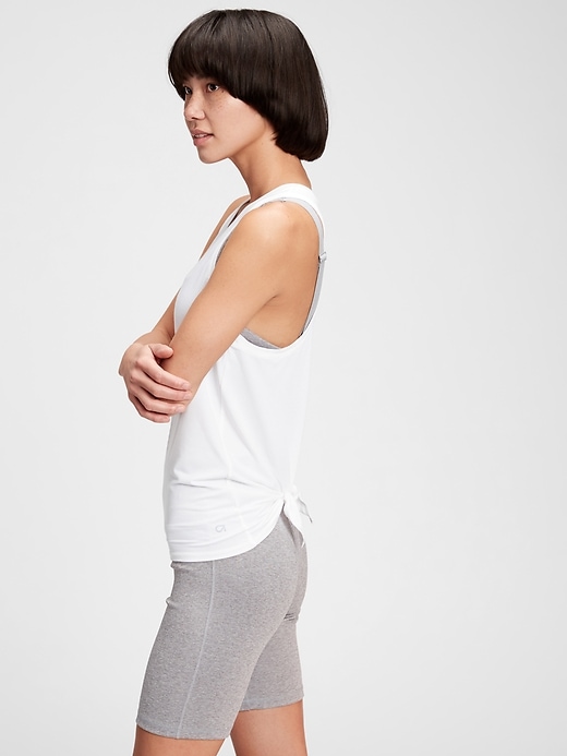 1 of 8 showing, with the color white of product GapFit Breathe Open-Back Tank