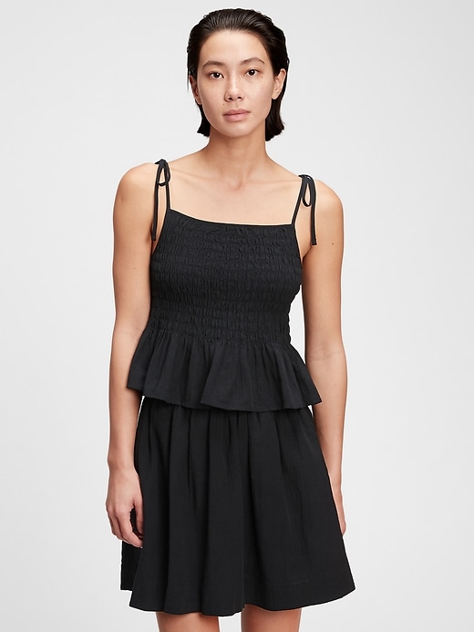 1 of 8 showing, with the color true black of product Smocked Peplum Cami