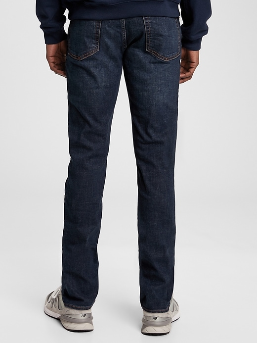 2 of 8 showing, with the color worn dark of product GapFlex Skinny Jeans with Washwell