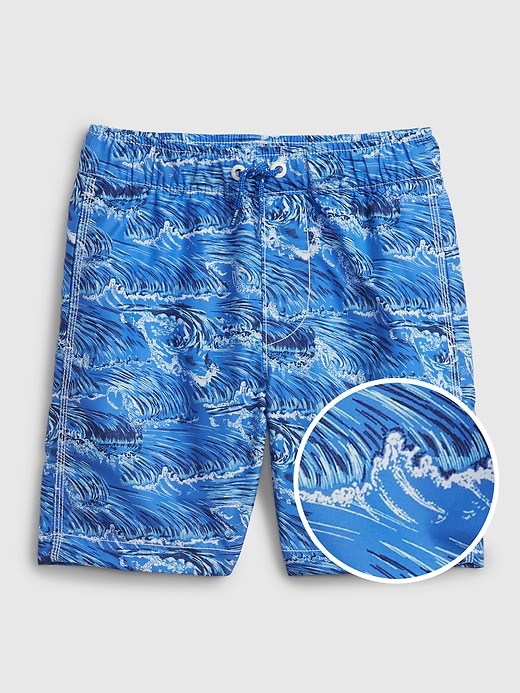 1 of 8 showing, with the color deep blue of product Kids 100% Recycled Wave Graphic Swim Trunks
