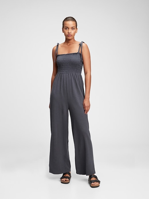 1 of 8 showing, with the color black night of product Smocked Shoulder-Tie Jumpsuit