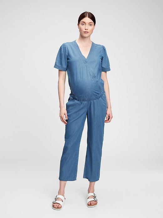 1 of 8 showing, with the color medium wash of product Maternity V-Neck Jumpsuit