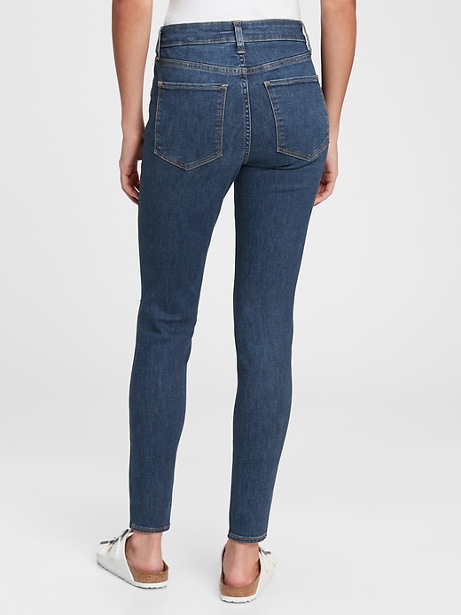 2 of 8 showing, with the color dark indigo of product Mid Rise Universal Jegging with Washwell