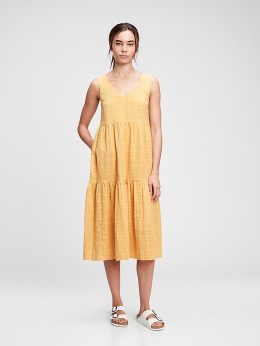 1 of 8 showing, with the color french almond yellow of product V-Neck Tiered Midi Dress