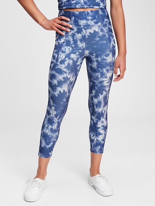 1 of 8 showing, with the color blue tie dye of product GapFit Teen Recycled Capri Leggings