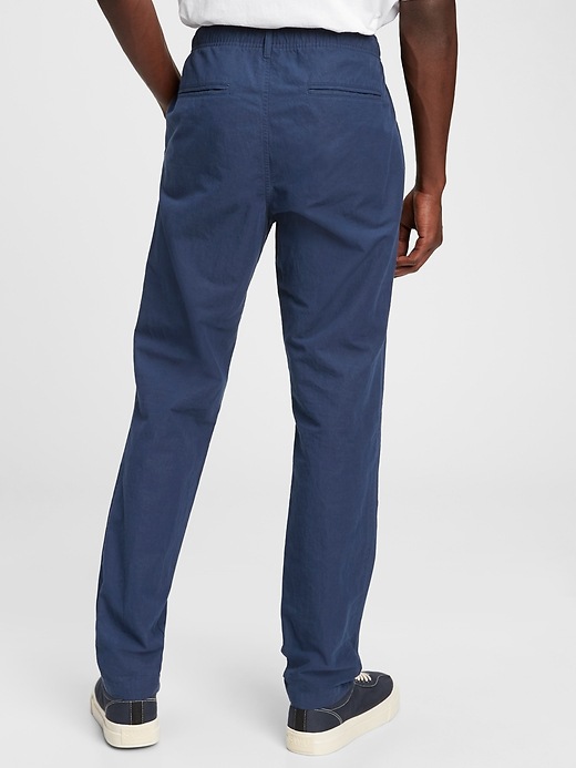 2 of 8 showing, with the color true indigo blue of product GapFlex Slim Taper Linen Pull-On Pants With E-Waist