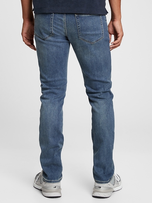 2 of 8 showing, with the color vintage blue of product GapFlex Soft Wear Slim Taper Jeans with Washwell