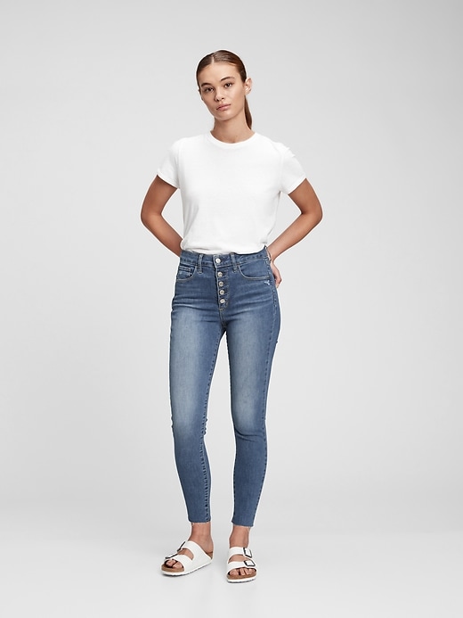 1 of 8 showing, with the color medium indigo of product High Rise Distressed Universal Jegging with Secret Smoothing Pockets