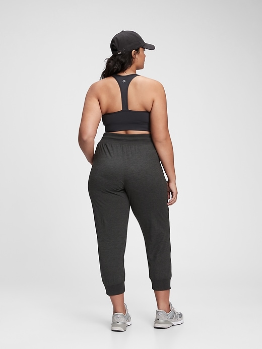 2 of 8 showing, with the color true black of product GapFit Brushed Tech Jersey Ankle Joggers