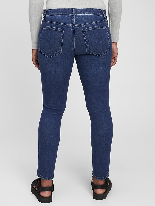 2 of 8 showing, with the color medium wash of product Maternity Inset Panel True Skinny Jeans