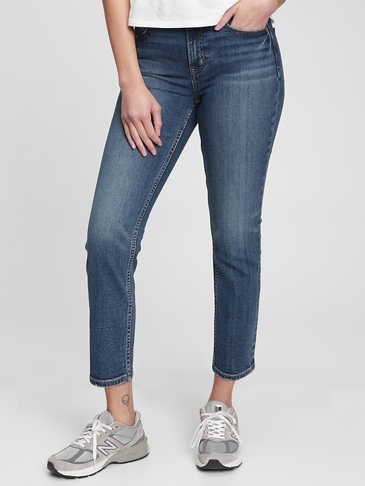 1 of 8 showing, with the color medium indigo of product Mid Rise Vintage Slim Jeans with Washwell