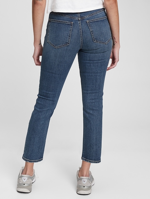 2 of 8 showing, with the color medium indigo of product Mid Rise Vintage Slim Jeans with Washwell