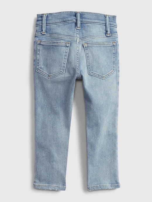 2 of 8 showing, with the color medium wash of product Toddler Distressed Skinny Jeans