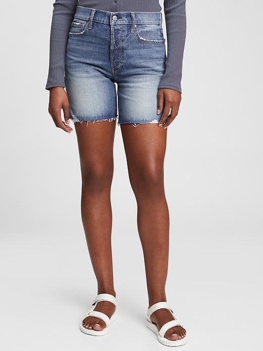 1 of 8 showing, with the color medium indigo of product High Rise Cheeky Midi Shorts