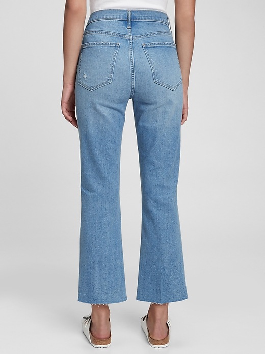 2 of 8 showing, with the color light indigo of product High Rise Distressed Kick Fit Jeans