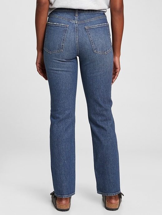 2 of 8 showing, with the color medium indigo of product High Rise Cheeky Straight Jeans