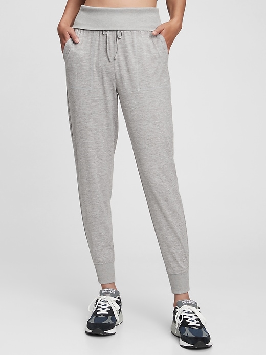 View large product image 1 of 1. GapFit Brushed Tech Jersey Joggers