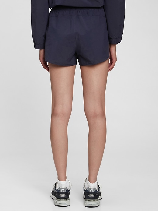 2 of 8 showing, with the color navy blue of product GapFit Runaround Shorts