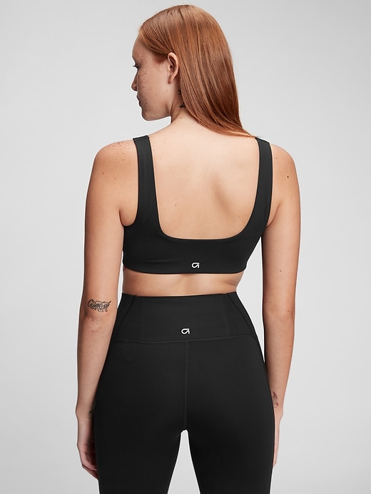 2 of 8 showing, with the color true black of product GapFit Low Impact Power Scoopneck Sports Bra