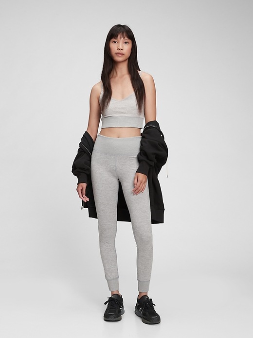 1 of 8 showing, with the color pilot grey of product GapFit Brushed Tech Jersey Leggings