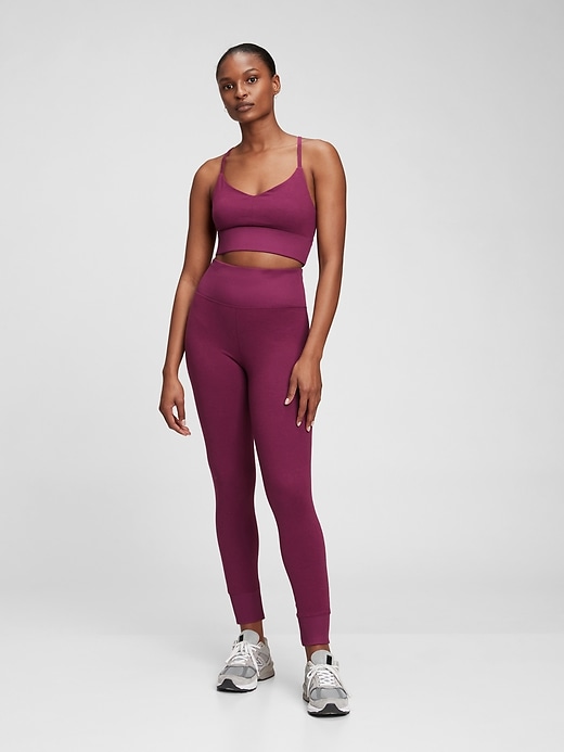 1 of 8 showing, with the color plum purple of product GapFit Brushed Tech Jersey Leggings