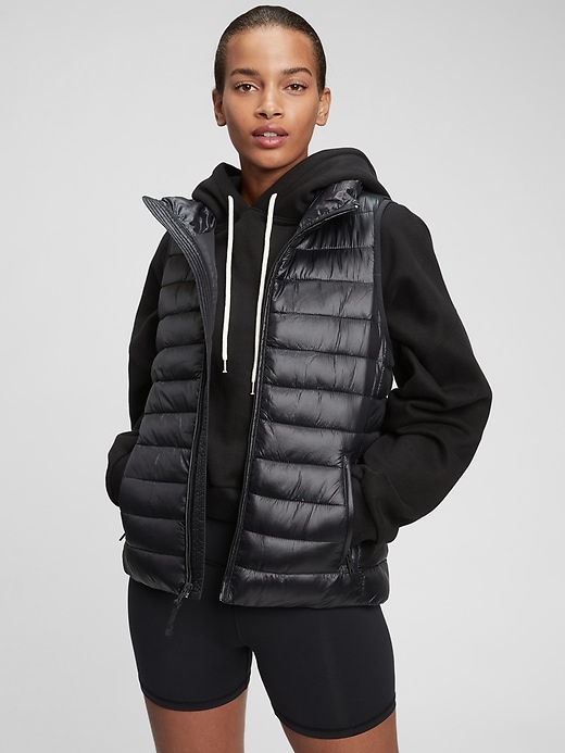 1 of 8 showing, with the color true black of product 100% Recycled Nylon Lightweight Puffer Vest
