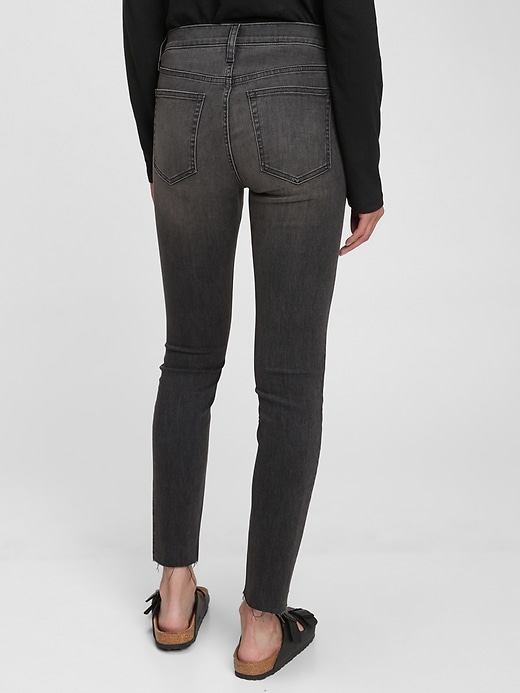2 of 8 showing, with the color washed black of product Mid Rise True Skinny Jeans with Washwell