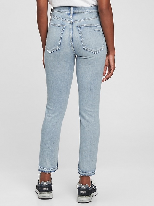 2 of 8 showing, with the color light indigo destroy of product High Rise Vintage Slim Jeans with Washwell