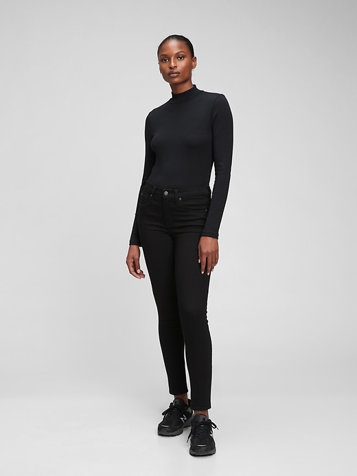 1 of 8 showing, with the color black rinse of product Mid Rise True Skinny Jeans with Washwell