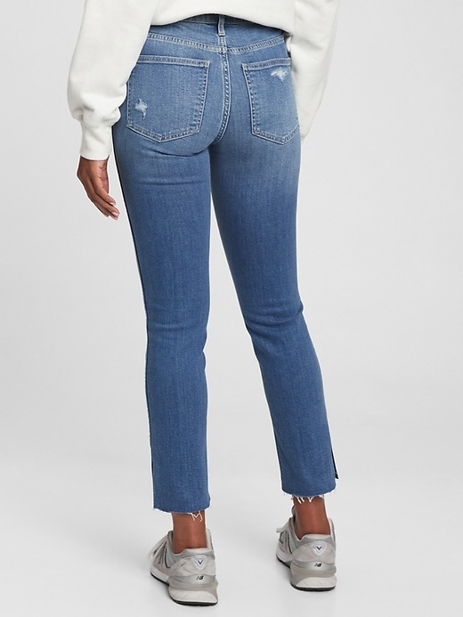 2 of 8 showing, with the color medium destroy of product Mid Rise Vintage Slim Jeans with Washwell